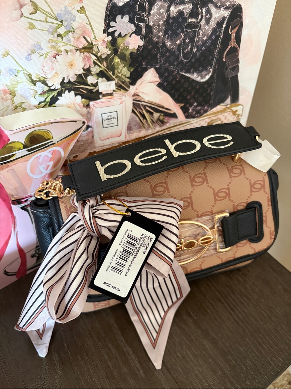 Bebe NWT Monogram Tan Crossbody Bag with Black Trim and Gold Hardware